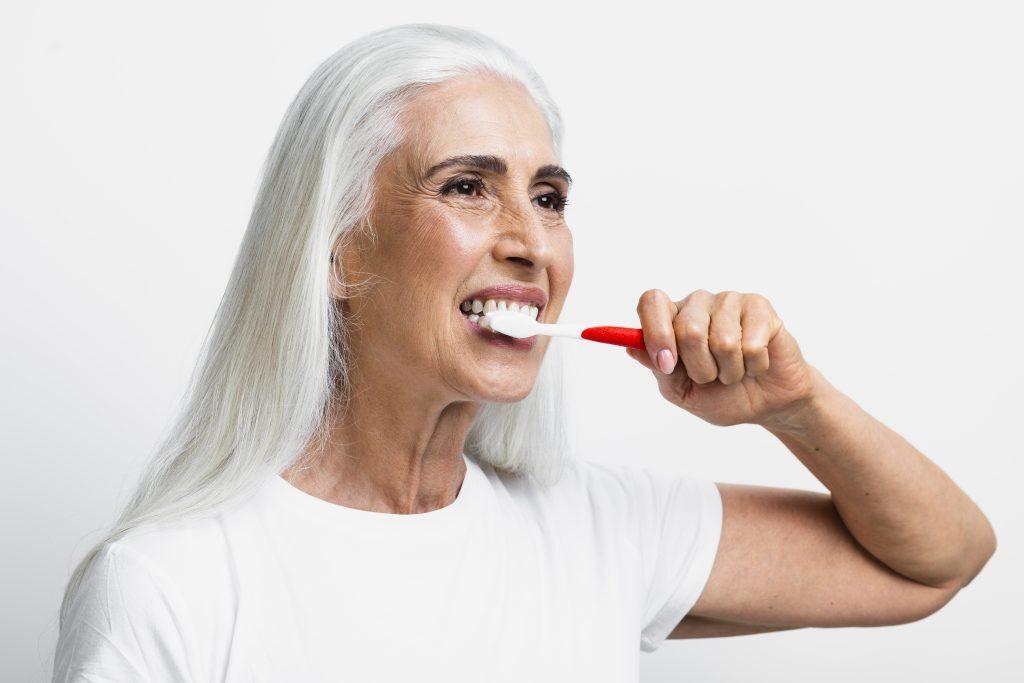 beautiful-woman-using-toothbrush