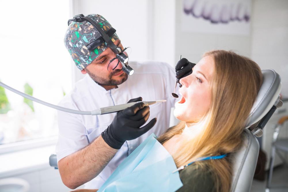 dentist-doing-dental-treatment-female-patient